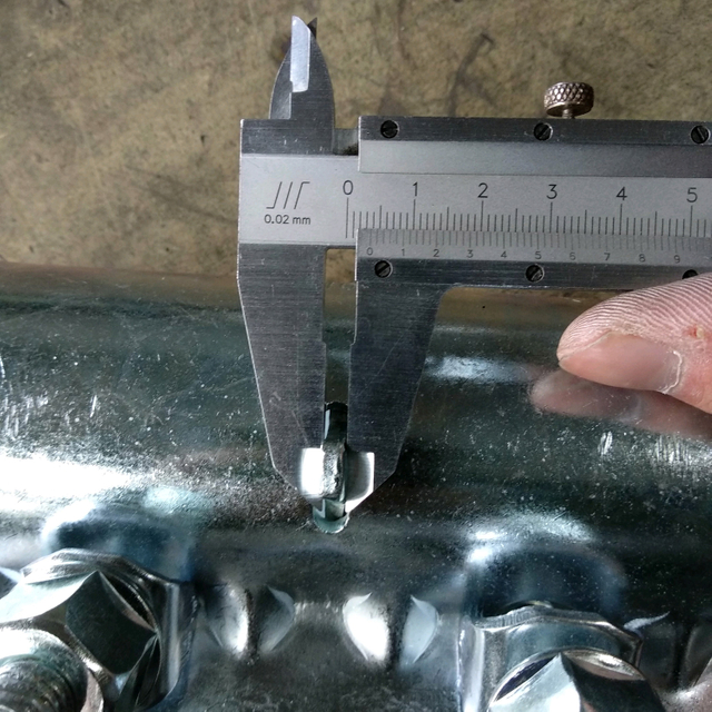 Coupler lengan perancah